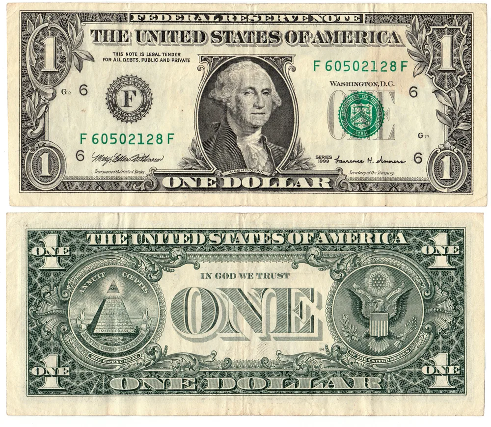 Billete de un dólar estadounidense, símbolo de los ingresos del exterior con 0 % de impuesto en Paraguay